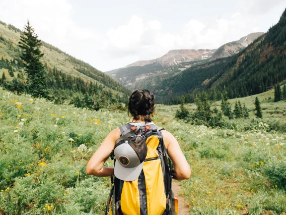 Person backpacking in a national park