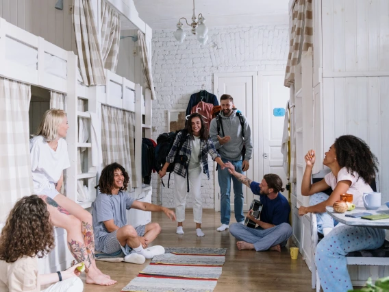 group of friends in a dorm room