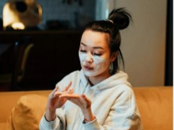 Young women doing a skin care mask. 
