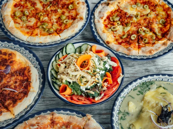 different pizzas on a table